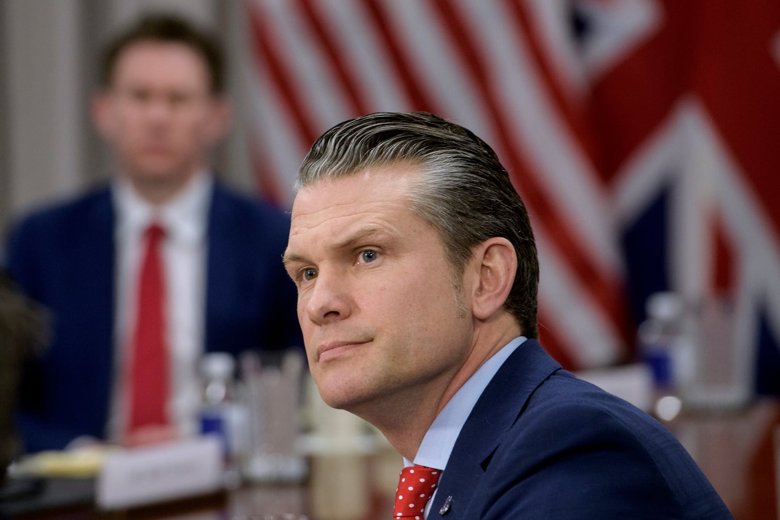 Defense Secretary Pete Hegseth responds to questions from reporters during a meeting with Britain's Defense Secretary John Healey at the Pentagon, Thursday, March 6, 2025, in Washington. (AP Photo/Rod Lamkey, Jr.)