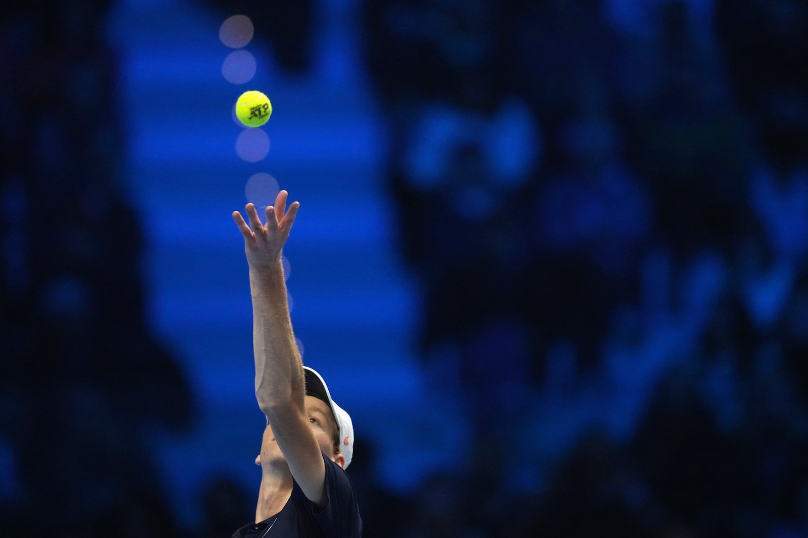 Italy's Jannik Sinner serves the ball to Russia's Daniil Medvedev during their singles tennis match of the ATP World Tour Finals at the Inalpi Arena, in Turin, Italy, Thursday, Nov. 14, 2024. (AP Photo/Antonio Calanni)