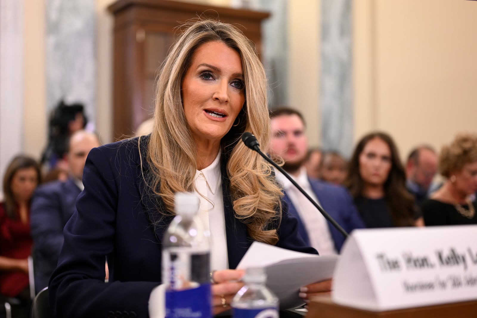 Kelly Loeffler, President Donald Trump's choice to be the administrator of the Small Business Administration, appears before the Senate Small Business and Entrepreneurship Committee for her confirmation hearing at the U.S. Capitol on Wednesday, Jan. 29, 2025, in Washington. (AP Photo/John McDonnell)