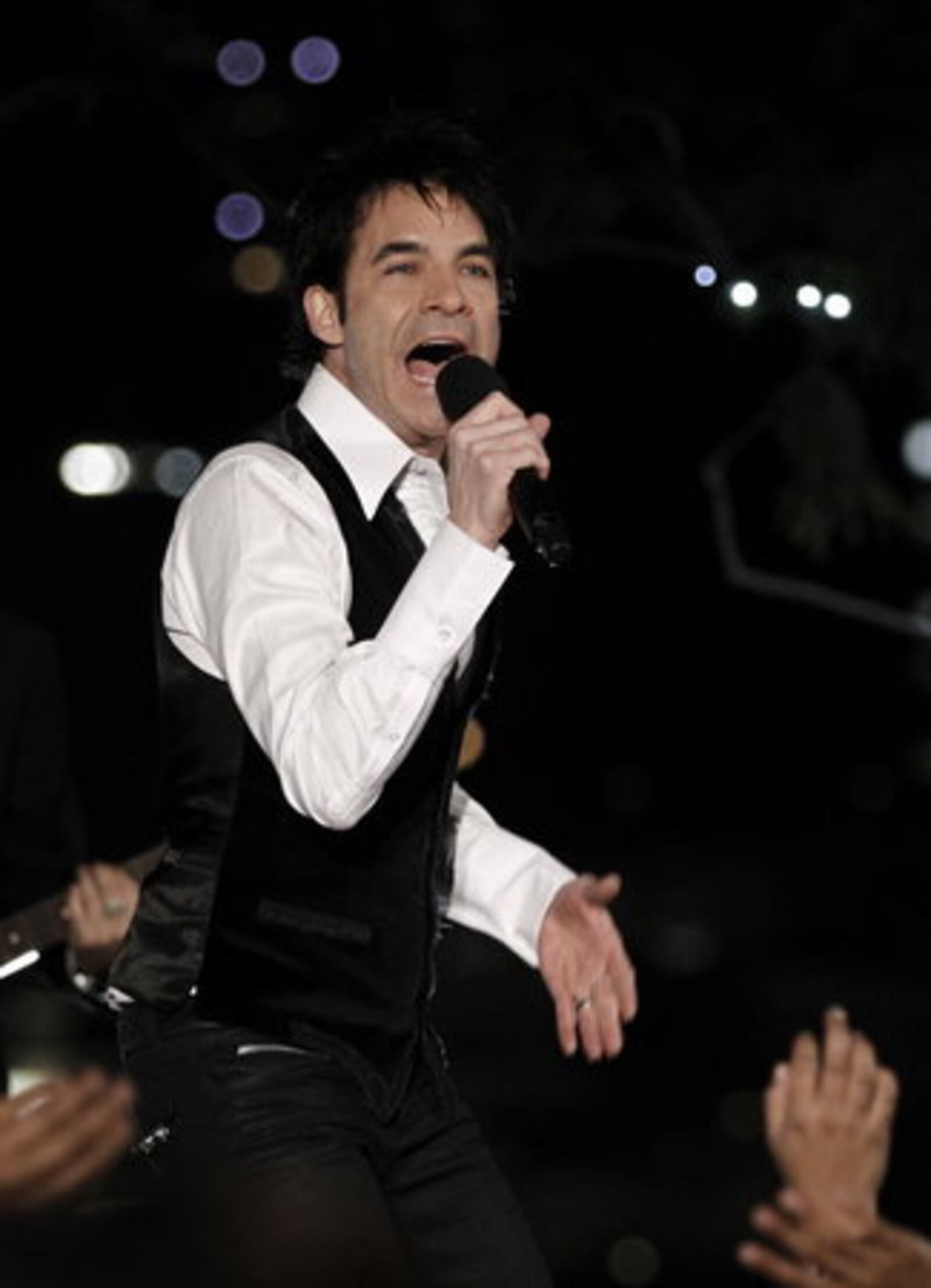 Singer Pat Monahan, of Train, performs during the Grammy Nominations Concert in Los Angeles on Tuesday, Nov. 30, 2010.