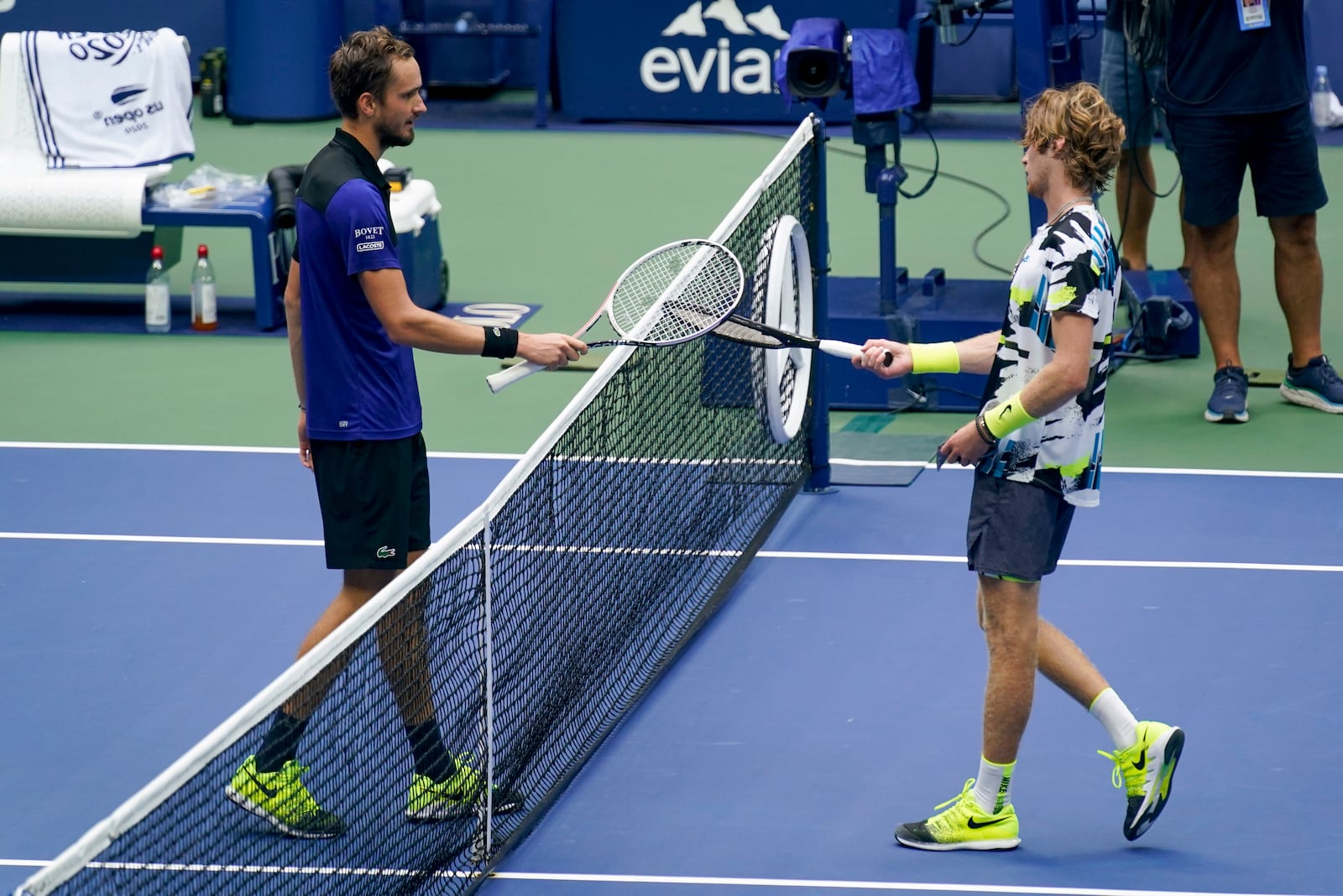 Daniil Medvedev, of Russia, left, greets Andrey Rublev, of Russia, at the net after winning their quarterfinal match of the US Open tennis championships, Wednesday, Sept. 9, 2020, in New York. (AP Photo/Seth Wenig)