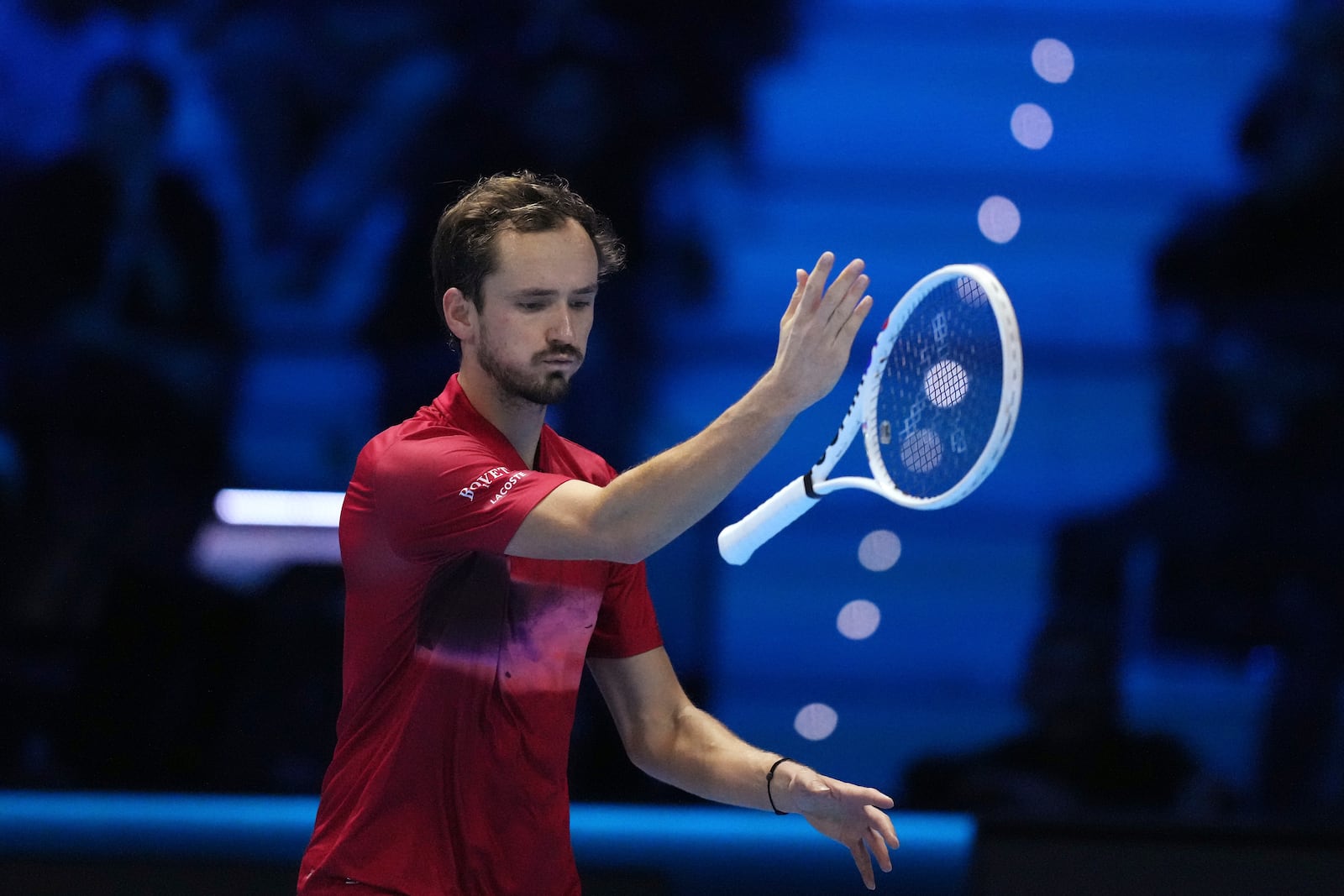 Russia's Daniil Medvedev reacts during the singles tennis match of the ATP World Tour Finals against United States' Taylor Fritz, at the Inalpi Arena, in Turin, Italy, Sunday, Nov. 10, 2024. (AP Photo/Antonio Calanni)