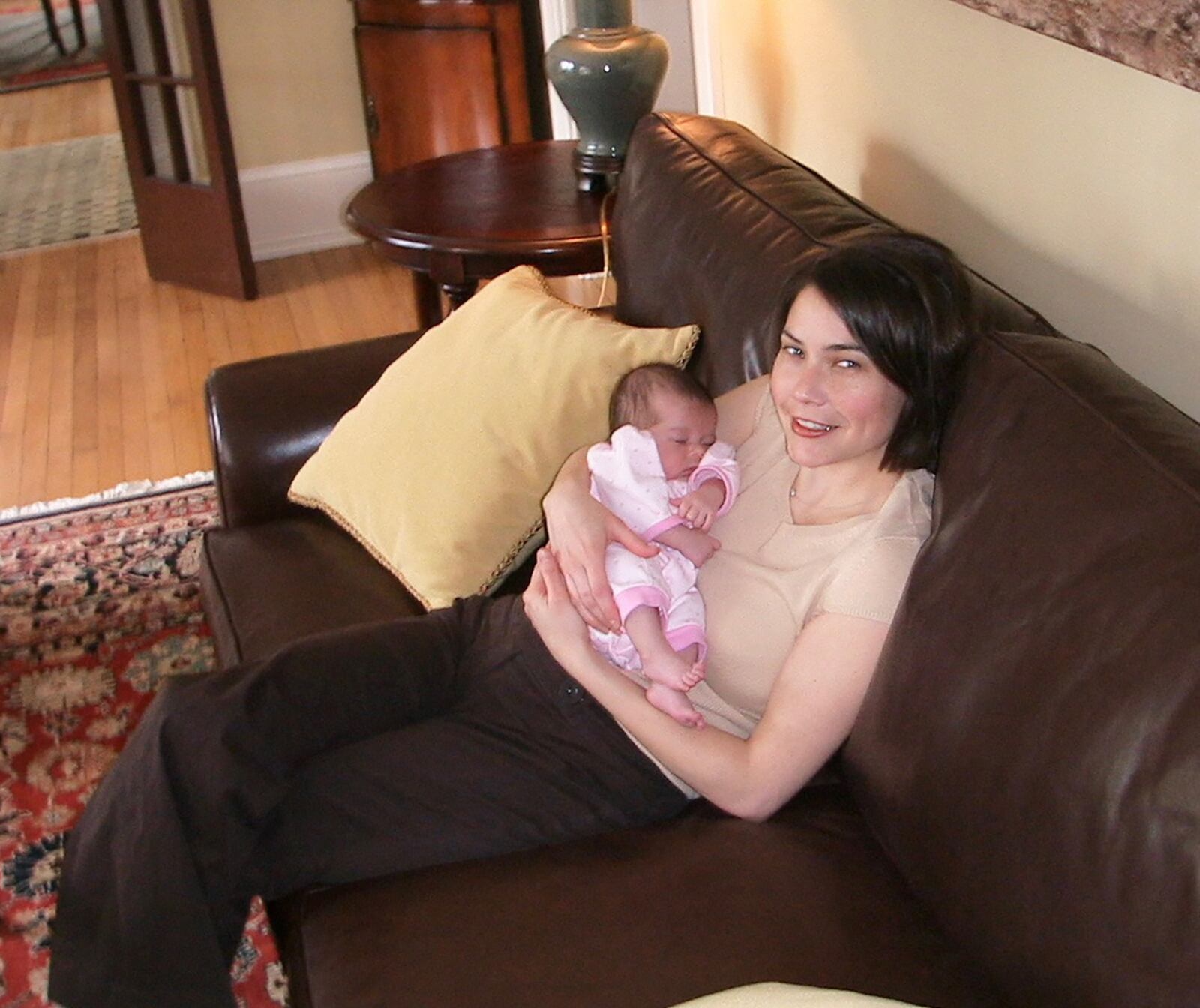 Raske with her newborn niece, Kathryn Tracanna, who inspired her to write her first children's picture book "a Magnificent Misunderstanding."