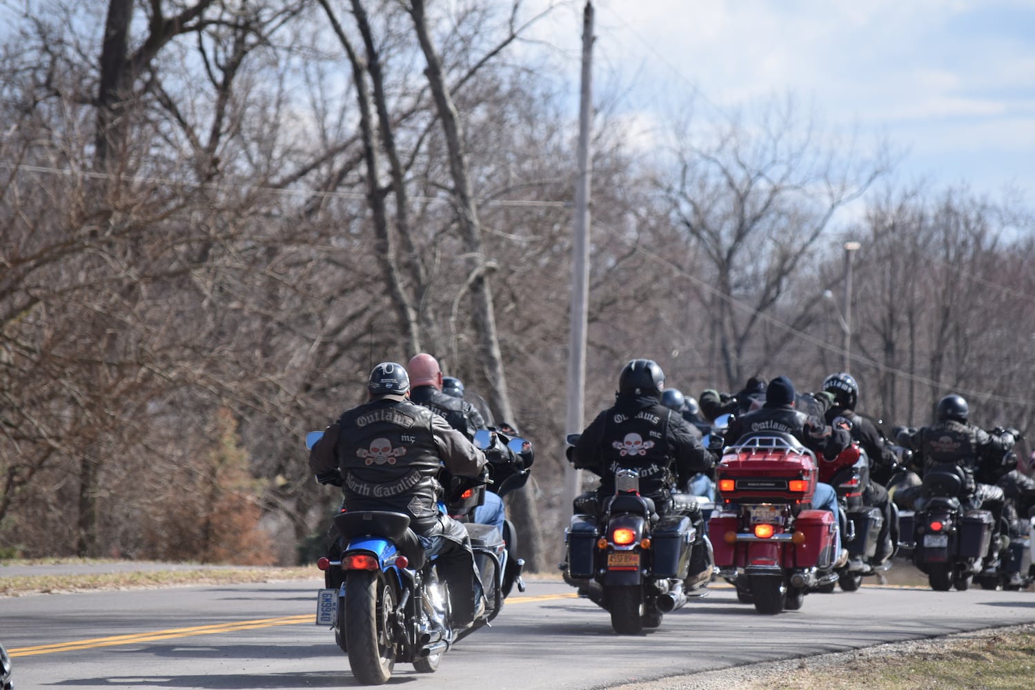 PHOTOS: Thousands of Outlaws attend motorcycle gang leaders funeral at Montgomery County Fairgrounds.