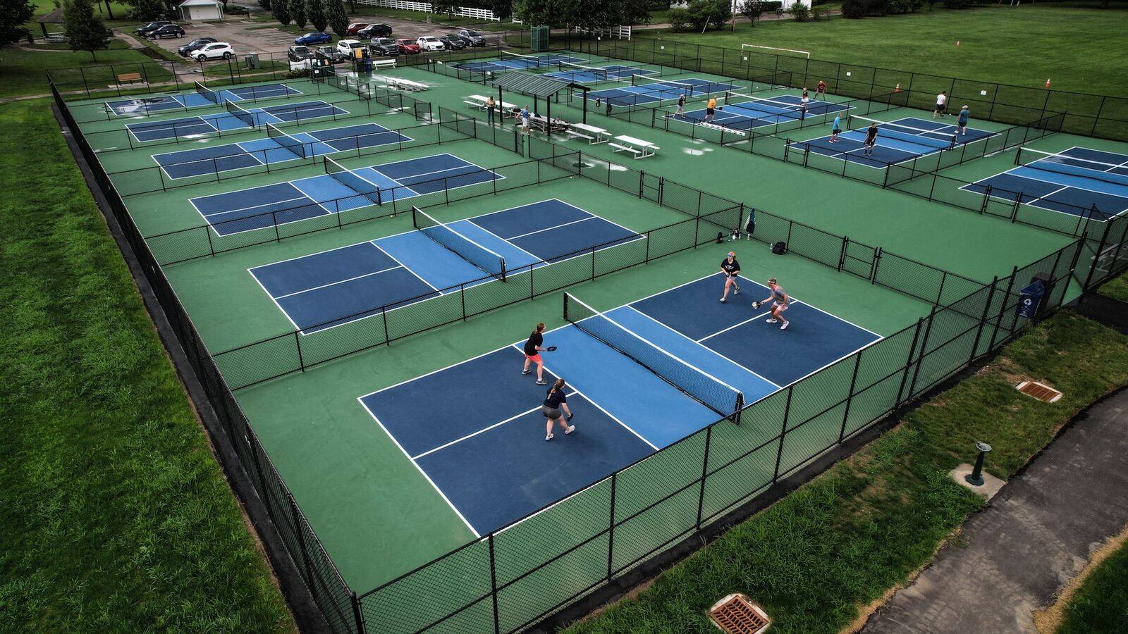 Pickleballers from all over the Miami Valley have more courts to enjoy at J.F. Kennedy Park in Kettering. JIM NOELKER/STAFF