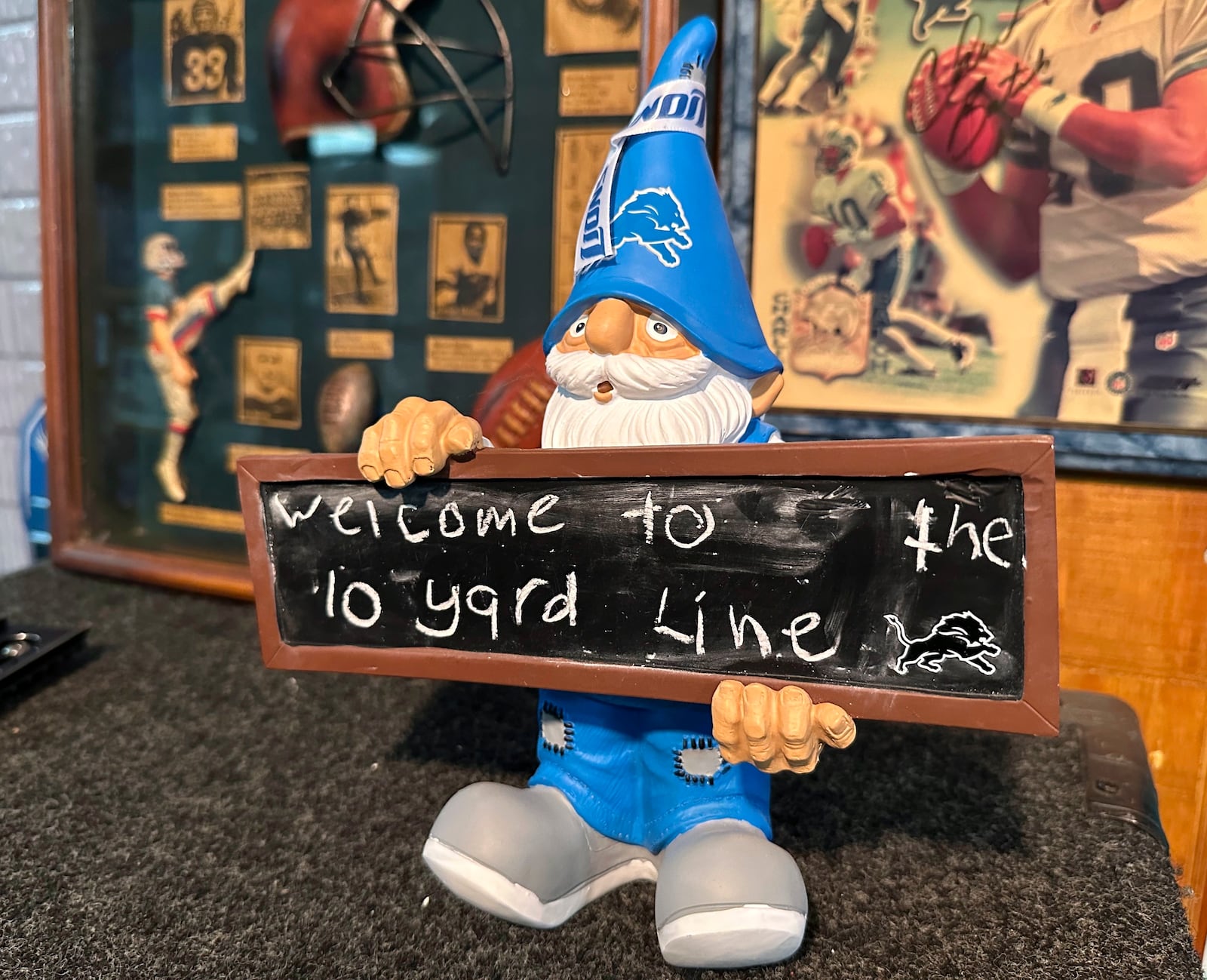 An NFL football Detroit Lions gnome is displayed in fan Rob Gonzales' basement Thursday, Jan. 16, 2025, in Frenchtown Township, Mich. (AP Photo/Mike Householder)