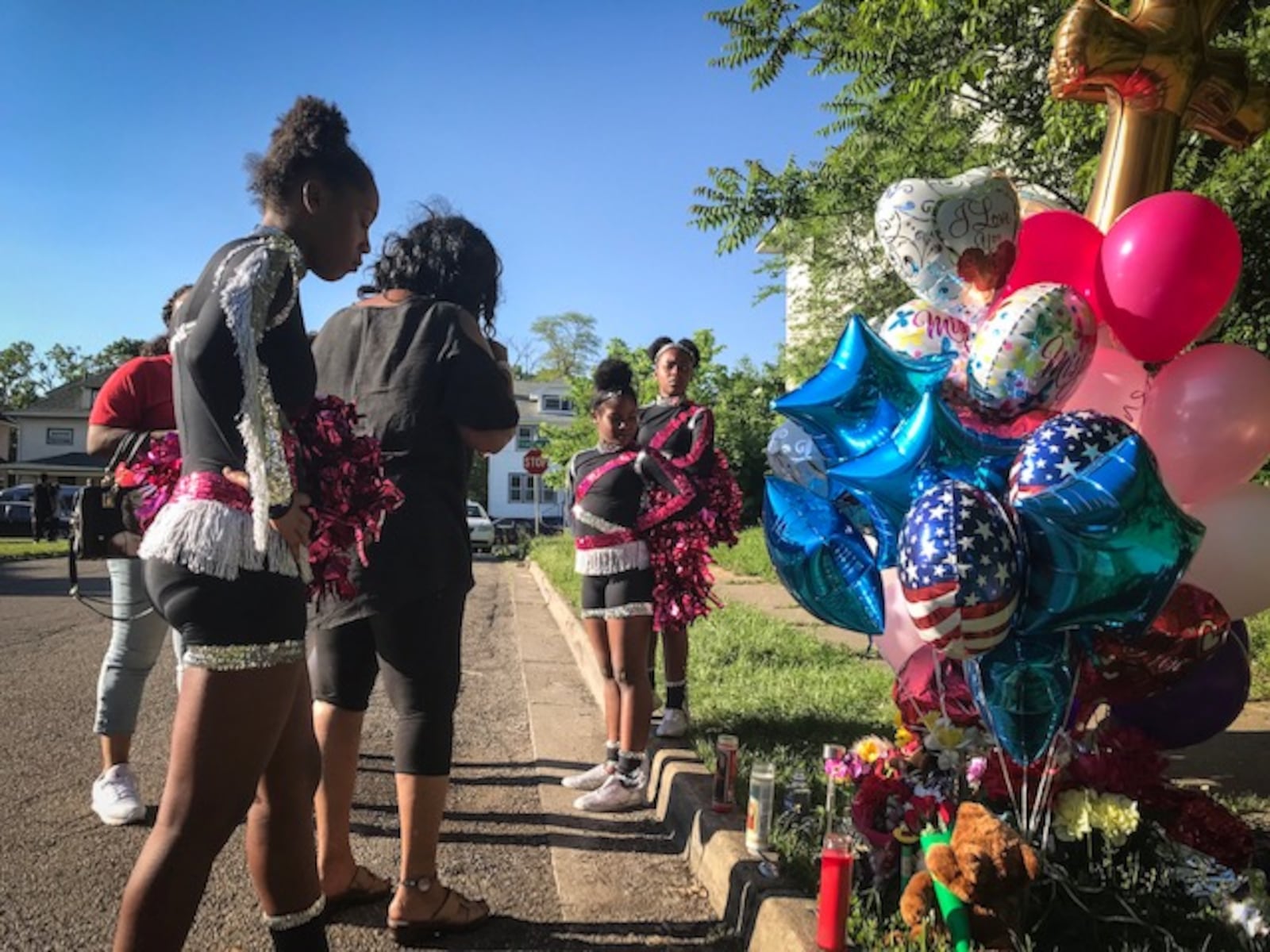 As many as 60 people turned out Friday evening, May 25, 2018, to remember Sherrell Wheatley, a mother and grandmother gunned down by stray gunfire on May 19. (Jim Noelker/Staff)