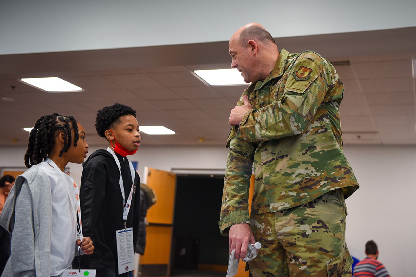 Col. Patrick Miller, 88th Air Base Wing commander, speaks with students about what it’s like to be in the Air Force during the Big Hoopla STEM Challenge on March 13 at Dayton Convention Center. U.S. AIR FORCE PHOTO/SENIOR AIRMAN ALEXANDRIA FULTON