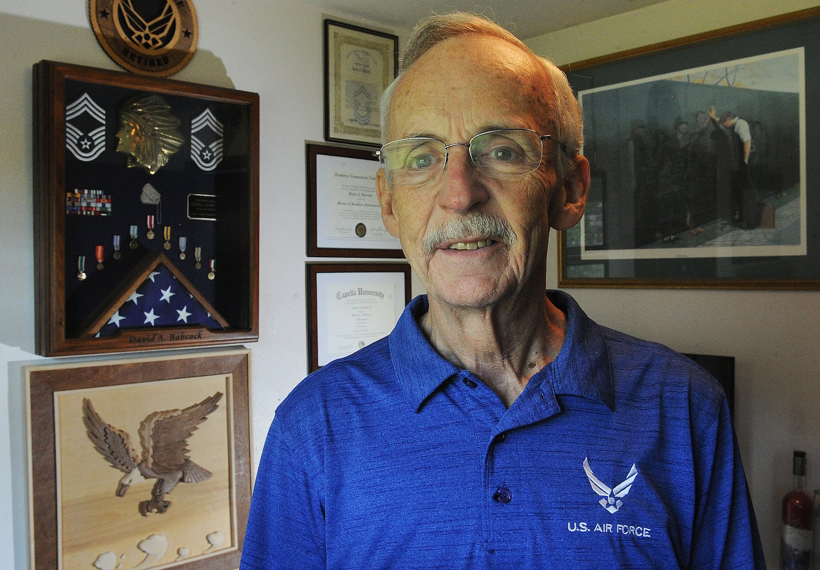 Air Force veteran Dave Babcock at his home in Enon. MARSHALL GORBY\STAFF