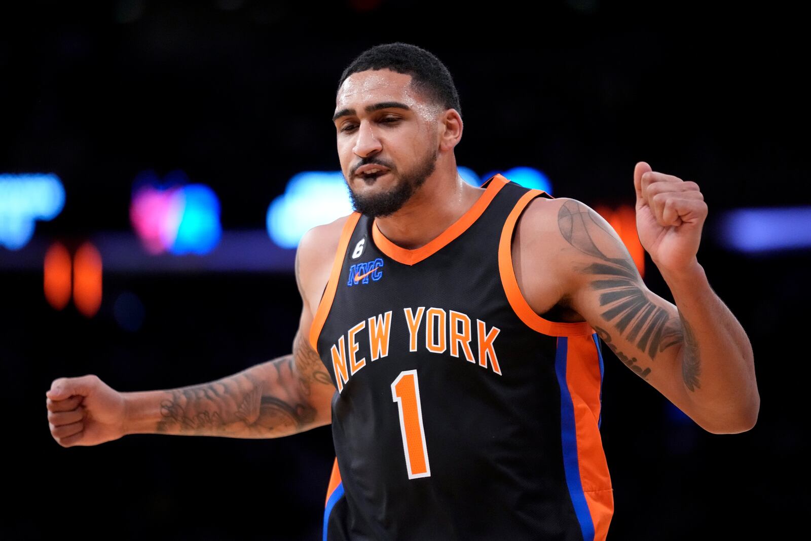 New York Knicks forward Obi Toppin (1) reacts after scoring during the second half of an NBA basketball game against the Philadelphia 76ers, Sunday, Feb. 5, 2023, in New York. (AP Photo/John Minchillo)