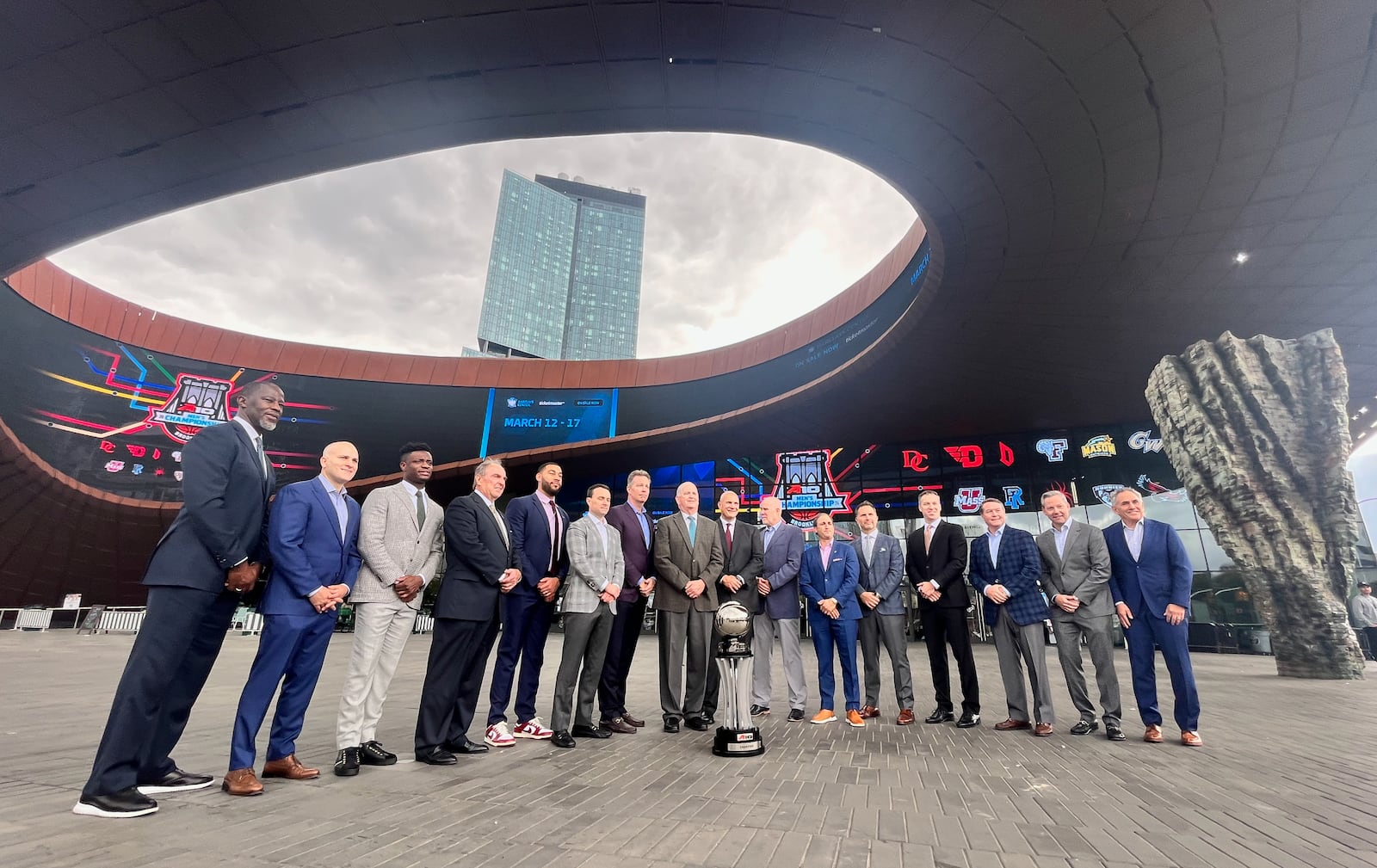 Dayton's Anthony Grant, far left, poses for a photo with other coaches at Atlantic 10 Conference Media Day on Tuesday, Oct. 17, 2023, at the Barclays Center in Brooklyn, N.Y. David Jablonski/Staff