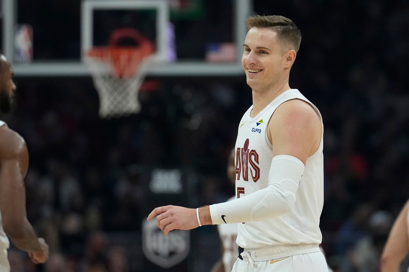 Cleveland Cavaliers guard Sam Merrill reacts after hitting a 3-point basket in the first half of an NBA basketball game against the Dallas Mavericks, Sunday, Feb. 2, 2025, in Cleveland. (AP Photo/Sue Ogrocki)