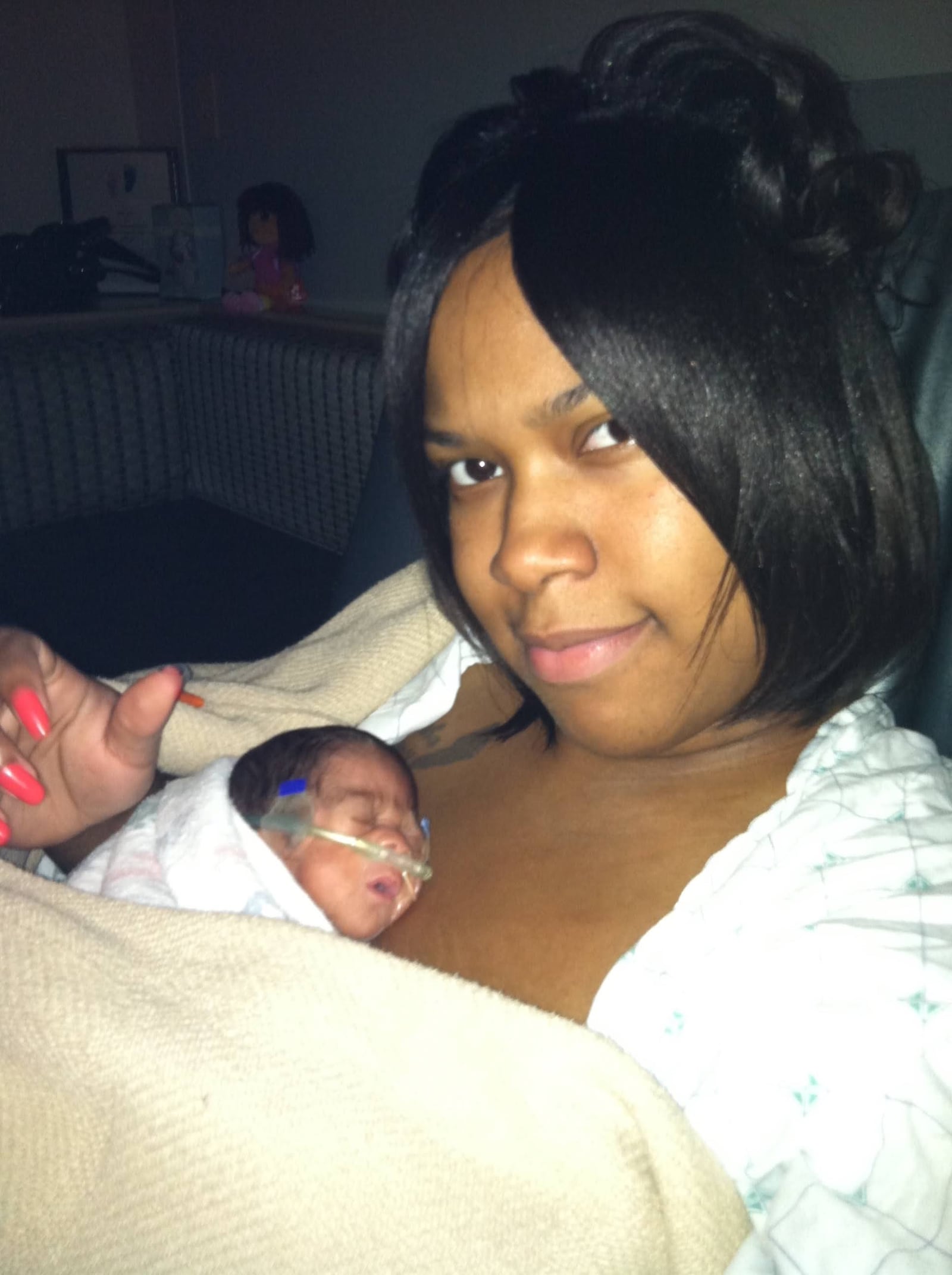 Sydney Beasley holds her daughter Soraya in 2013. Beasley has given birth three times, each time before 25 weeks along in her pregnancy. Soraya is Beasley's only surviving child.