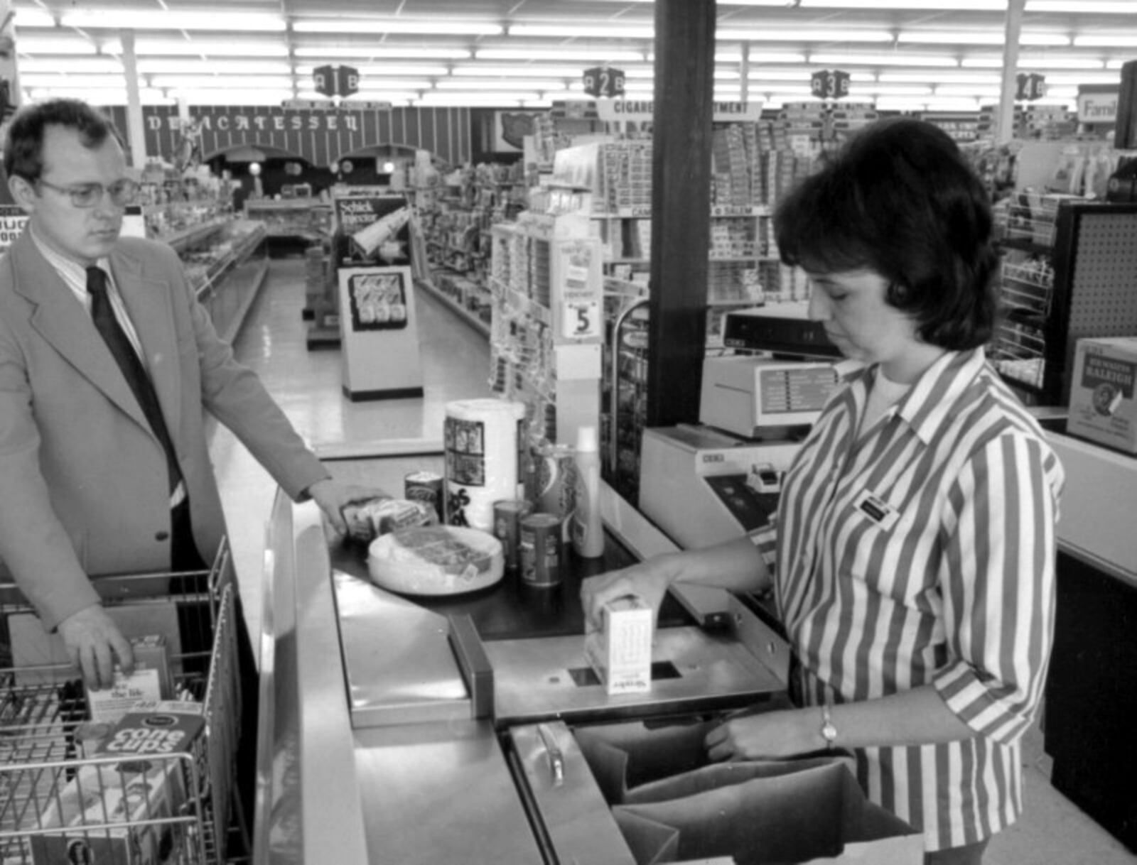 An employee at Marsh supermarket in Troy scans groceries in this image from the mid-1970s. The UPC code was scanned for the first time on June 26, 1974 on an NCR system at the same supermarket. FROM THE NCR ARCHIVE AT DAYTON HISTORY