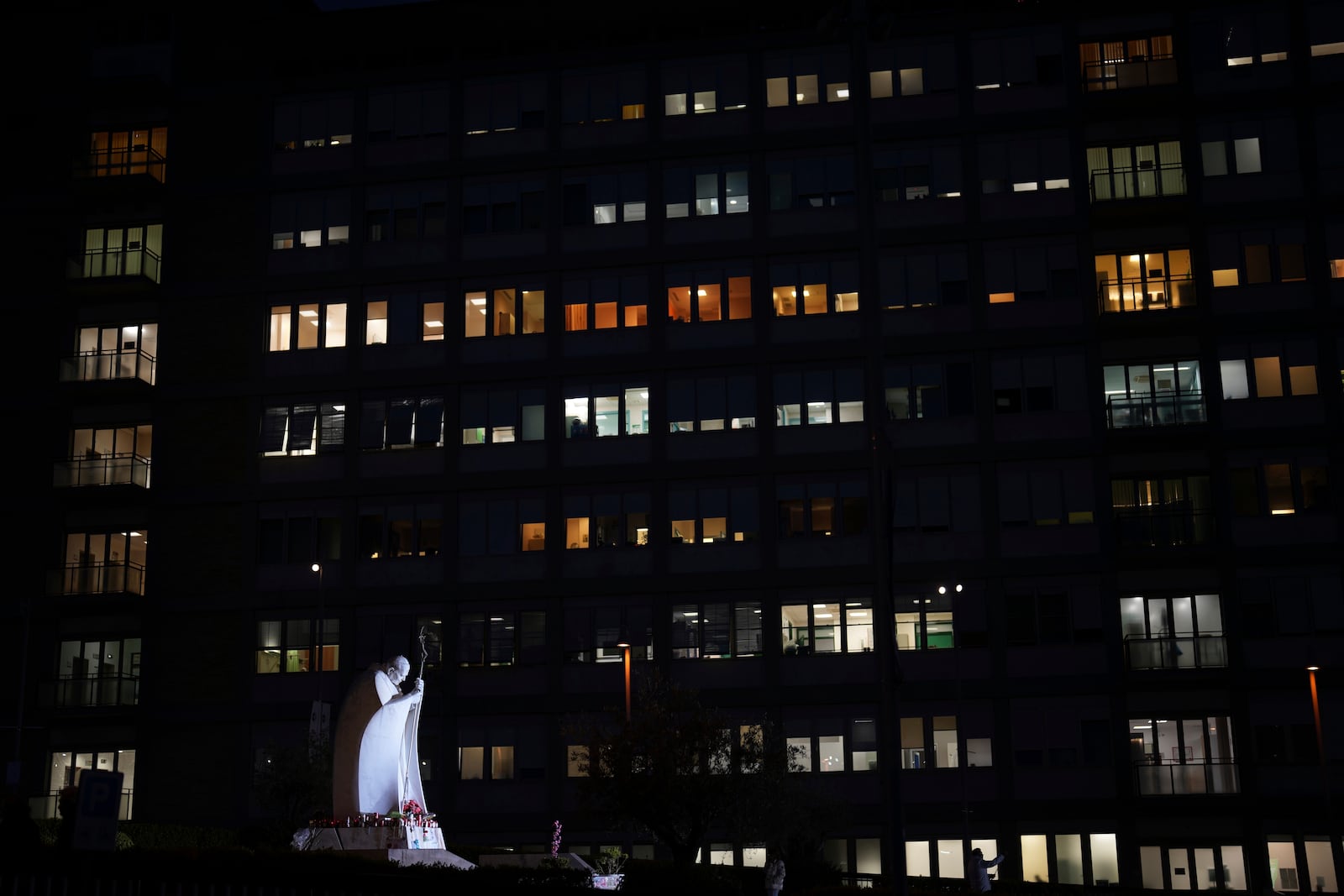 Night view of the Agostino Gemelli Polyclinic in Rome, Thursday, March 13, 2025, where Pope Francis is being treated for bilateral pneumonia since Feb.14. (AP Photo/Domenico Stinellis)