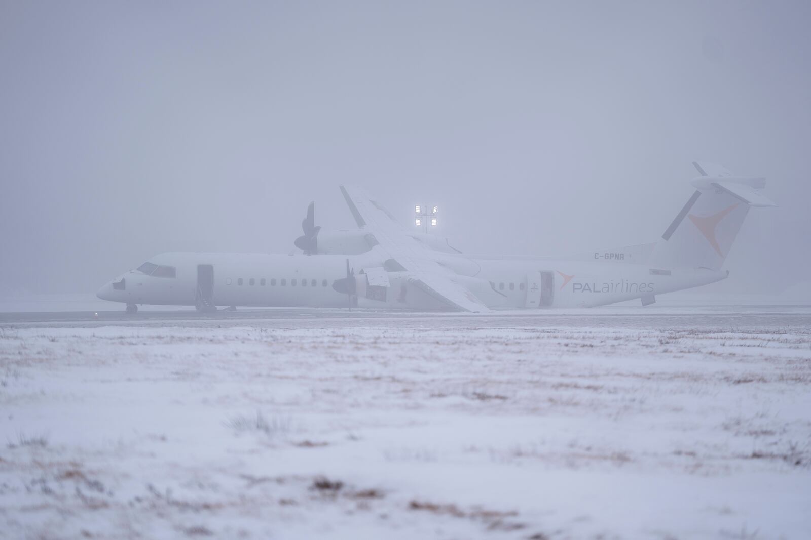 An Air Canada Express flight operated by Pal Airlines skidded off the runway Saturday night after catching fire at Halifax Stanfield International Airport is seen on Sunday, Dec. 29, 2024, in Halifax, Nova Scotia. (Darren Calabrese/The Canadian Press via AP)