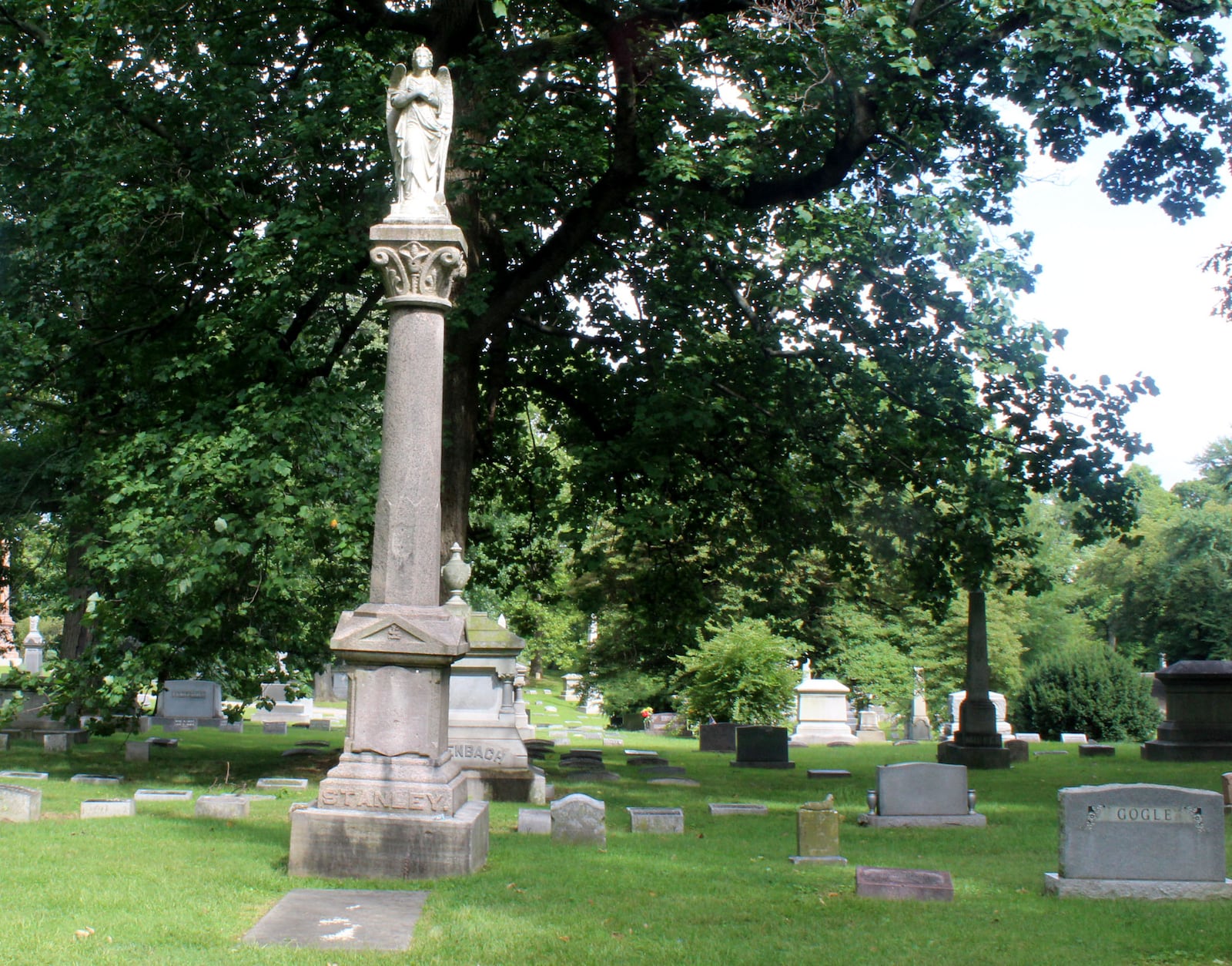 Gypsy queen Matilda Stanley's monument (left) at  Woodland Cemetery  in Dayton. She is one of the women found on the walking or virtual tours  on Woodland Cemetery & Arboretum’s mobile app. STAFF 