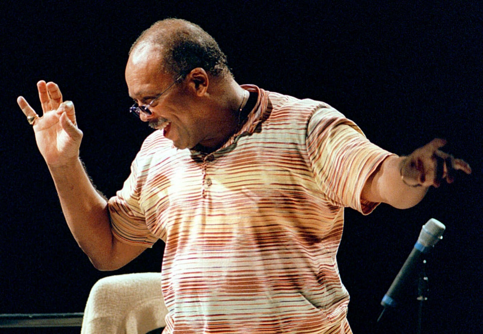 FILE - U.S. musician Quincy Jones directs the Orchestra National de France Tuesday, July 4, 2000, in Paris, during rehearsals prior the evening's unique concert. Quincy Jones died at age 91. (AP Photo/Laurent Emmanuel, File)