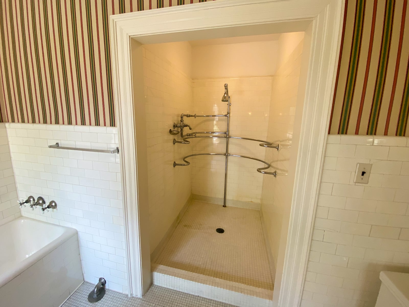 Scenes from a tour of Hawthorn Hill, the Wright family mansion in Oakwood. The home was designated a National Historic Landmark in 1991. An American Standard needle shower was installed to help Orville soothe his aching body. GREG LYNCH / STAFF