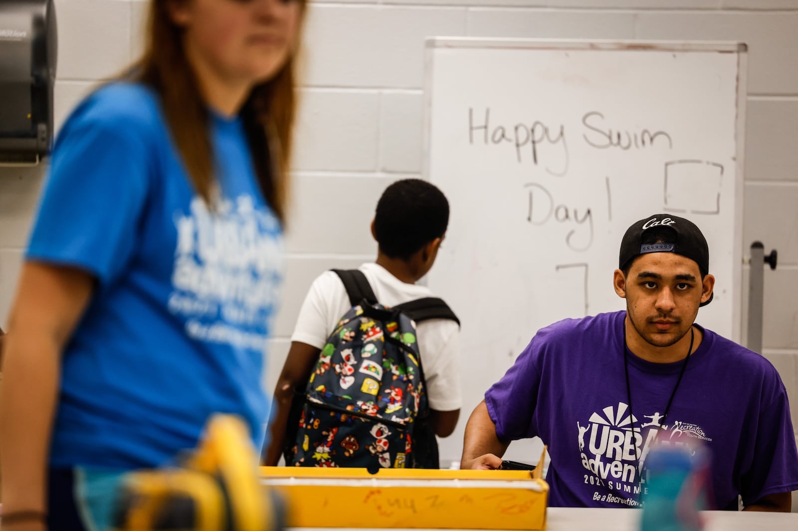 Summer camp councilor, Julian Newson watches the children at Northwest Recreation Center Thursday June 10, 2021. Jim Noelker/Staff