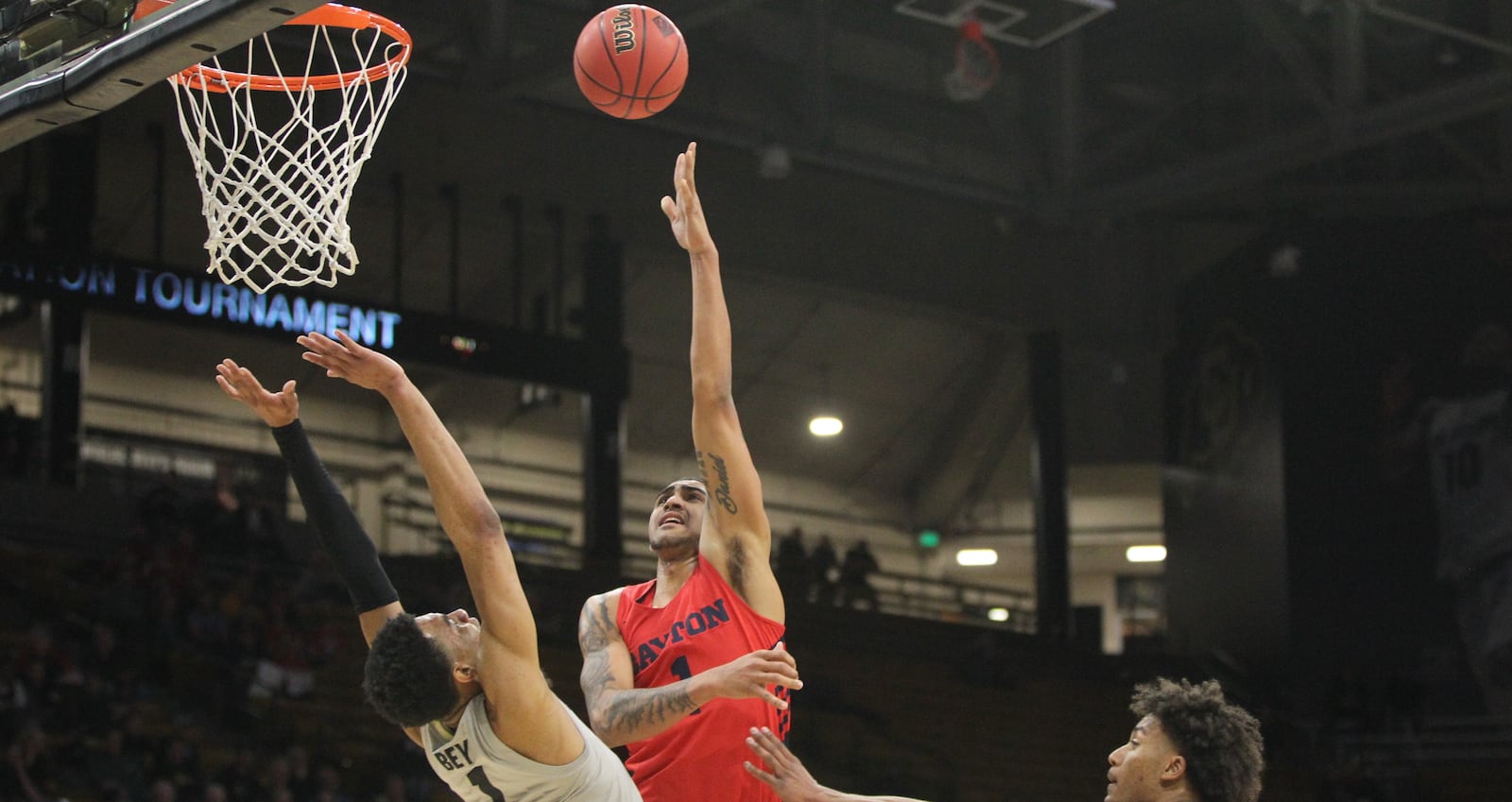 Dayton's Obi Toppin scores against Colorado on Tuesday, March 20, 2019, at the CU Events Center in Boulder, Colo.