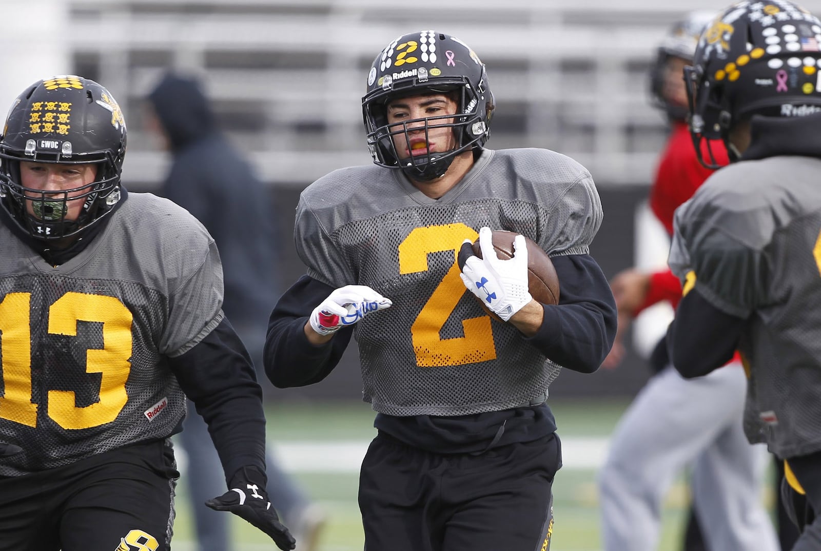 Sidney High School senior running back Isaiah Bowser is one of the front runners for Ohio’s Mr. Football. As a child, Bowser was abused by his mother’s boyfriend who burned Bowser’s hands in scalding water and ended up imprisoned because of it. TY GREENLEES / STAFF