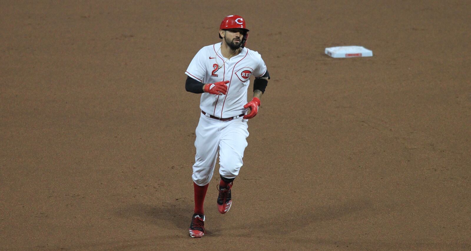 Nick Castellanos, of the Reds, rounds the bases after a home run against the Indians on Monday, Aug. 3, 2020, at Great American Ball Park in Cincinnati.