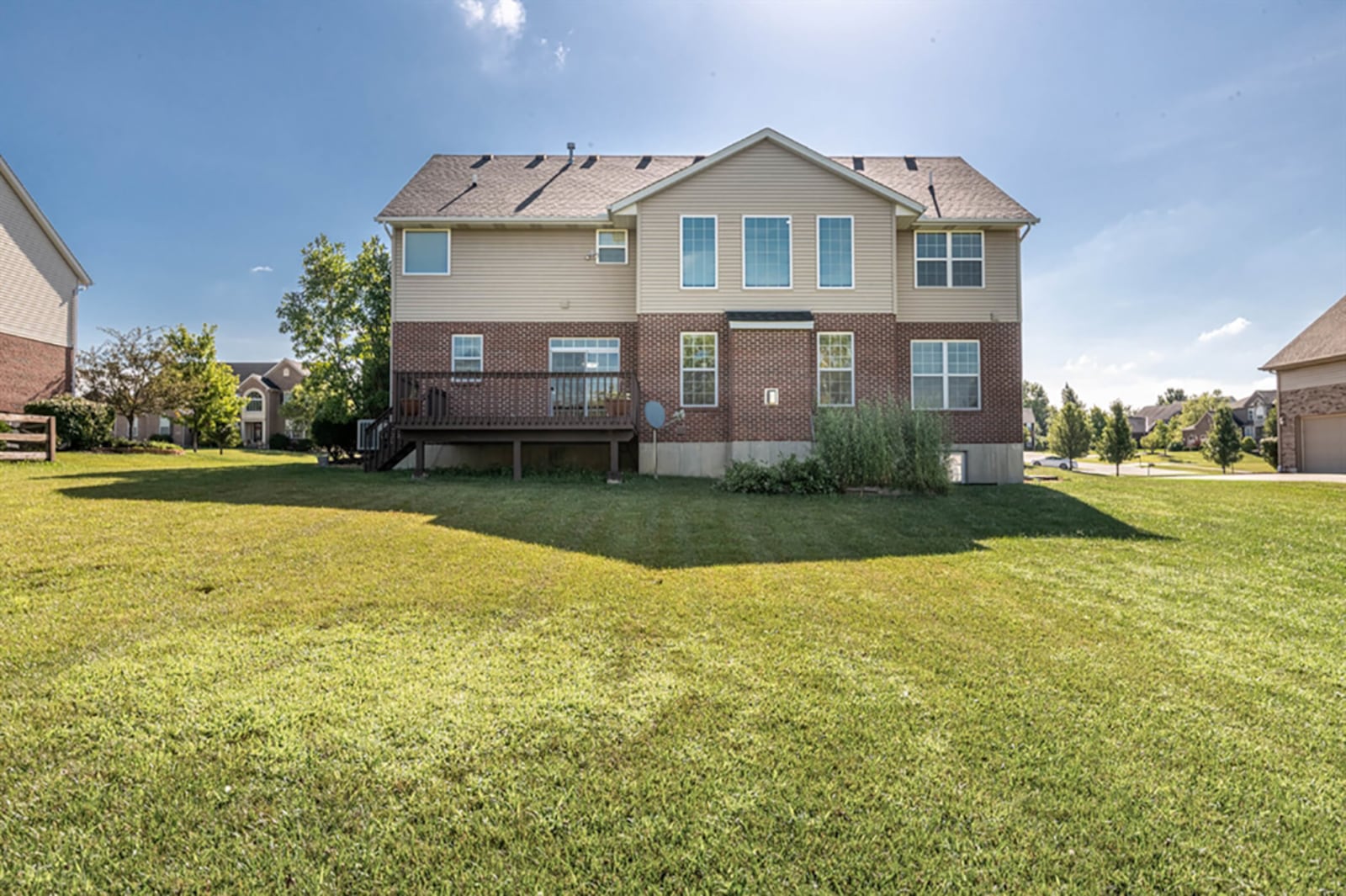 Patio doors from the breakfast room open to the balcony deck and open back yard. The two-story home has volume ceilings, 4 bedrooms and a finished basement.
CONTRIBUTED PHOTO