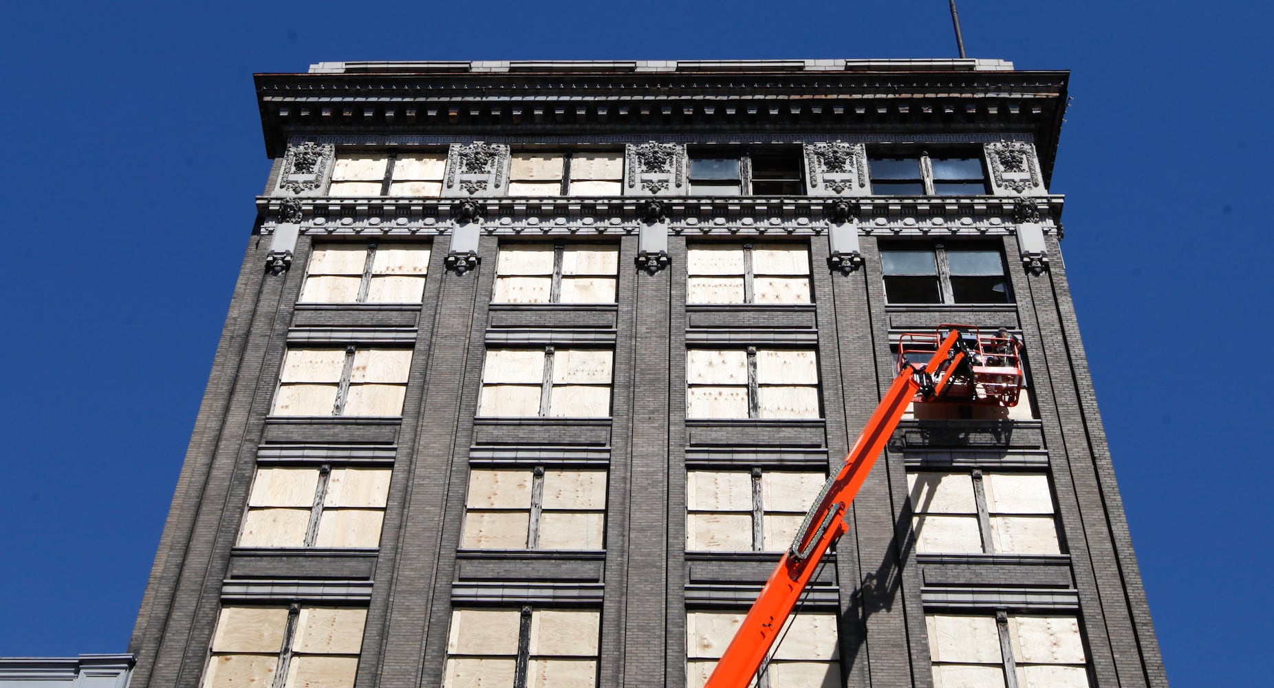 Arcade windows being boarded up