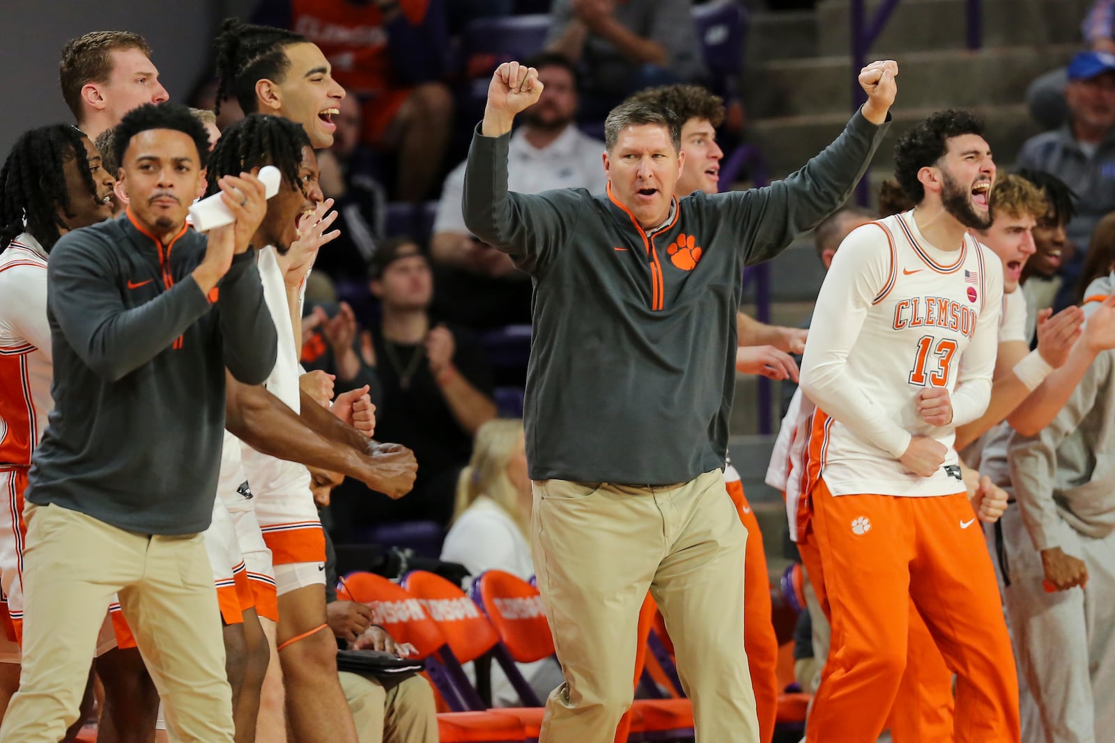 Clemson head coach Brad Brownell celebrates an offensive foul by Kentucky during the first half of an NCAA college basketball game Tuesday, Dec. 3, 2024, in Clemson, S.C. (AP Photo/Artie Walker Jr.)