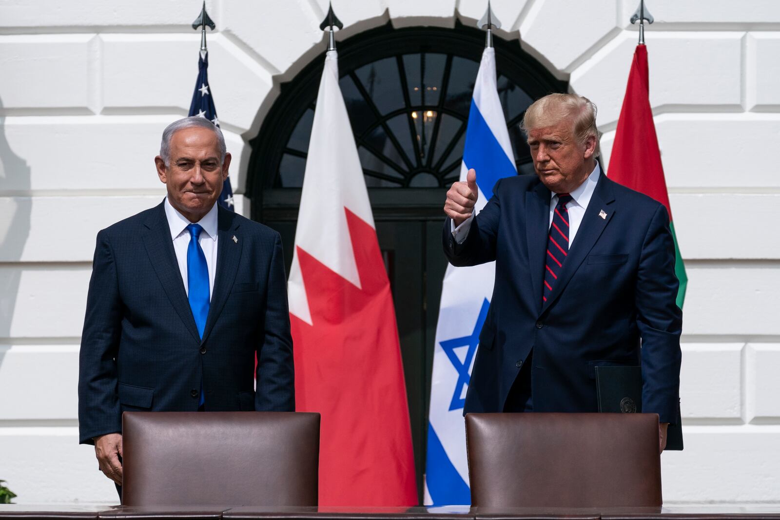 FILE- Israeli Prime Minister Benjamin Netanyahu, left, and President Donald Trump stand as they prepare to depart after the Abraham Accords signing ceremony on the South Lawn of the White House, Sept. 15, 2020, in Washington. (AP Photo/Alex Brandon, File)