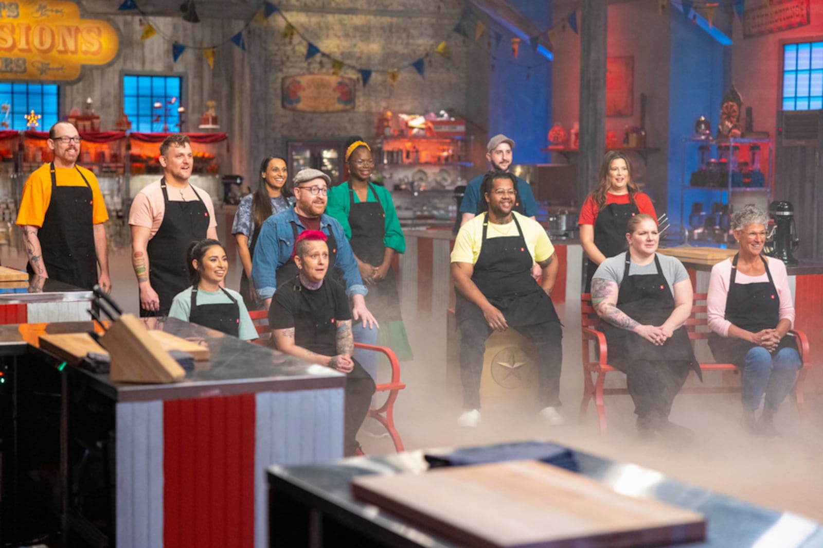 Contestants (left to right) Chad Conklin, James Cox, Mandi De Toro, Dan Pivovar, Hollie Fraser, Adesuwa Elaiho, Michael Yu, Ryan Mccord, Christa Aylward, Stacy Day and Phoebe Martinson receive their first challenge on Season 9 of Food Network's "Halloween Baking Championship." PHOTO BY ROB PRYCE