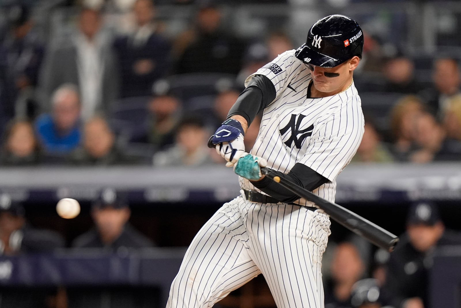 New York Yankees' Anthony Rizzo hits a single against the Cleveland Guardians during the second inning in Game 1 of the baseball AL Championship Series Monday, Oct. 14, 2024, in New York. (AP Photo/Frank Franklin II)