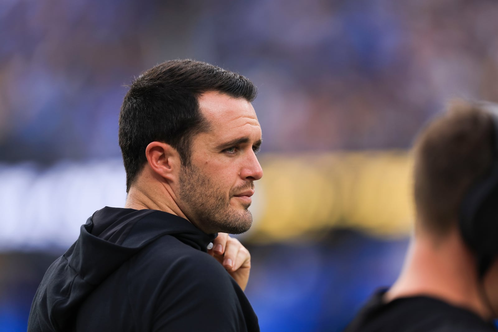 Injured New Orleans Saints quarterback Derek Carr watches from the sideline in the second half of an NFL football game against the Los Angeles Chargers in Inglewood, Calif., Sunday, Oct. 27, 2024. (AP Photo/Ryan Sun)