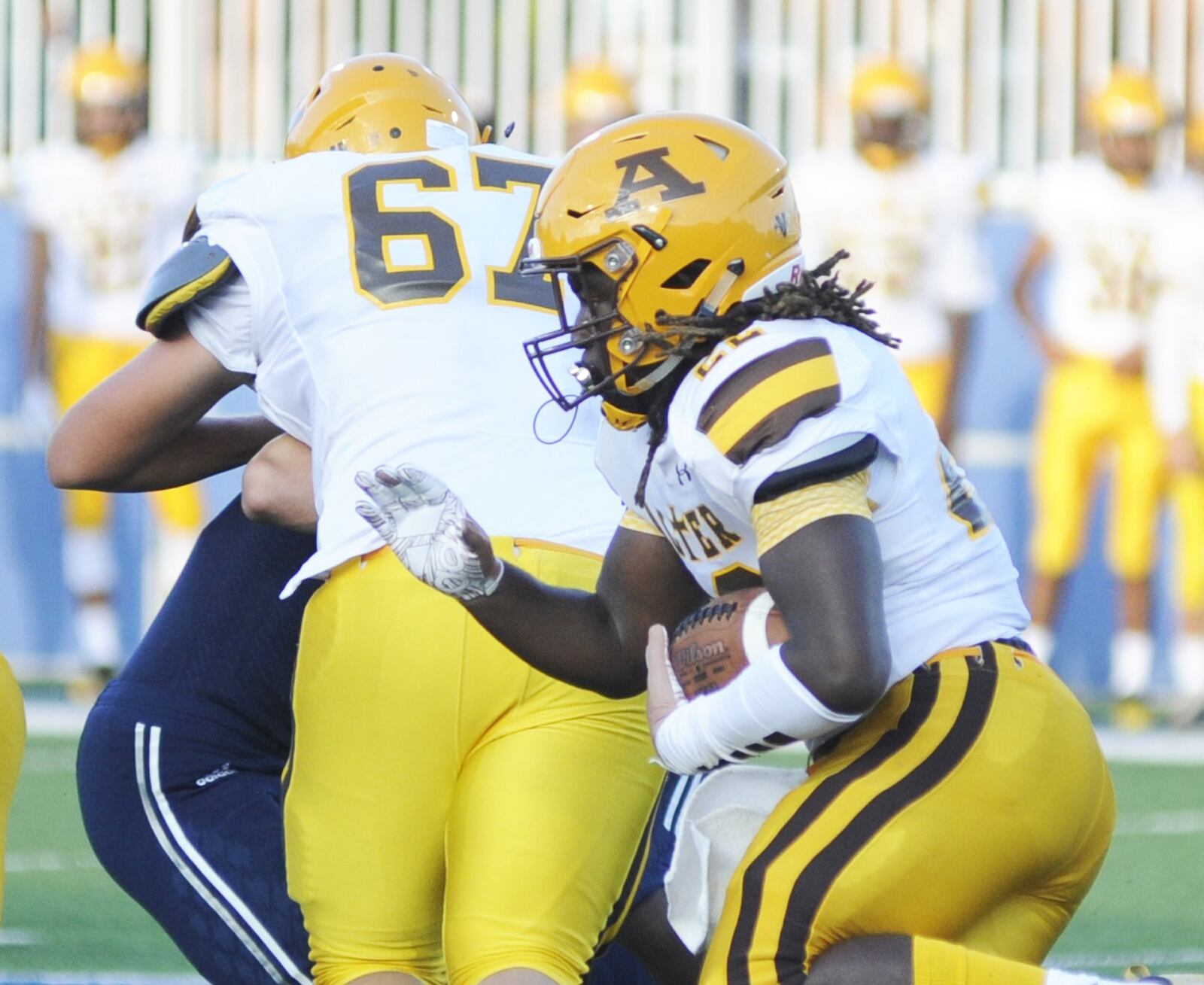 Alter’s Branden McDonald, shown against Fairmont in Week 1, had a program-record 344 yards rushing in a 49-14 win at Cincinnati Roger Bacon on Friday, Sept. 14, 2018. MARC PENDLETON / STAFF