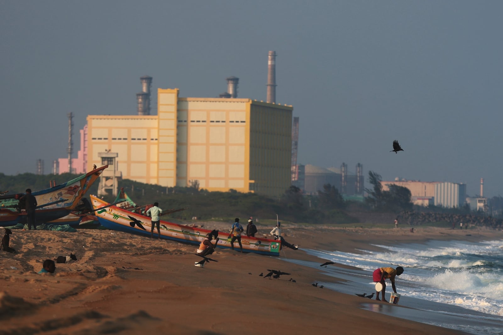 Fishermen park their boats on the shore near the Madras Atomic Power Station located at Kalpakkam, in the Indian state of Tamil Nadu, Monday, Feb. 10, 2025. (AP Photo/ R. Parthibhan)