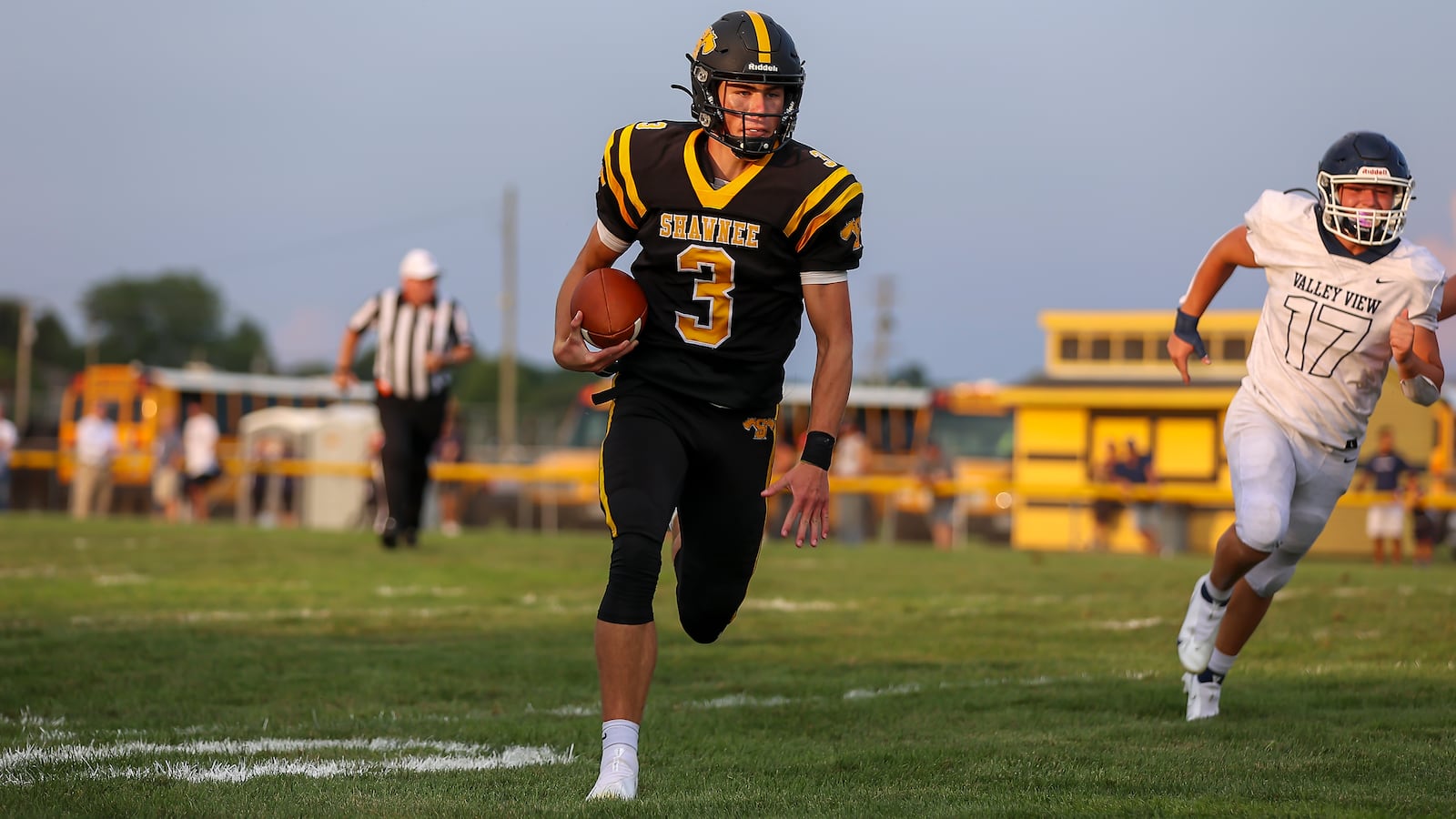 Shawnee High School quarterback RJ Griffin runs the ball during their game on Friday night in Springfield. The Spartans won 25-7. CONTRIBUTED PHOTO BY MICHAEL COOPER