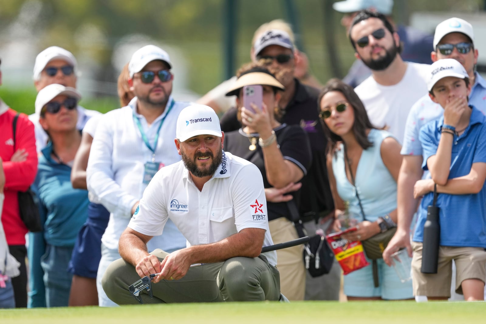 Stephan Jaeger, of Germany, studies his putt on the green of the 11th hole during the third round of the Mexico Open golf tournament in Puerto Vallarta, Mexico, Saturday, Feb. 22, 2025. (AP Photo/Fernando Llano)