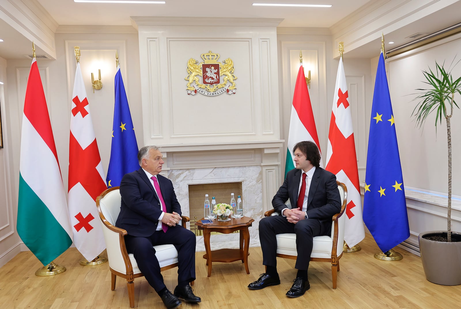 In this photo released by Georgian Prime Minister Press Office on Tuesday, Oct. 29, 2024, Georgian Prime Minister Irakli Kobakhidze, right, and Prime Minister of Hungary Viktor Orban speak during their meeting in Tbilisi, Georgia. (Georgian Prime Minister Press Office via AP)