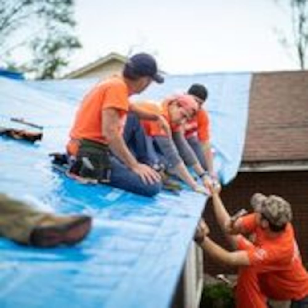 Volunteers help tornado-damaged communities