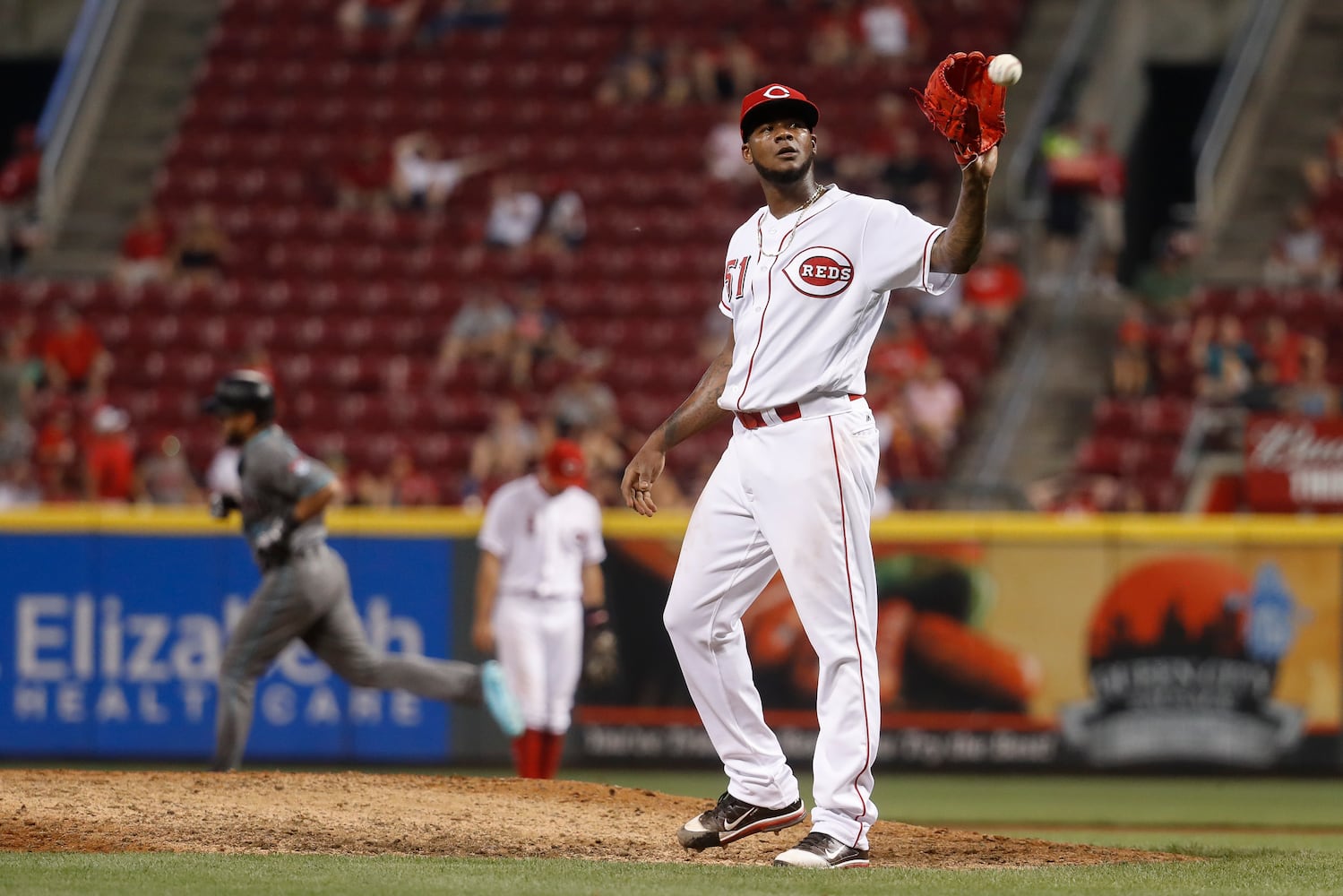 PHOTOS: Zack Cozart only positive in Reds’ loss