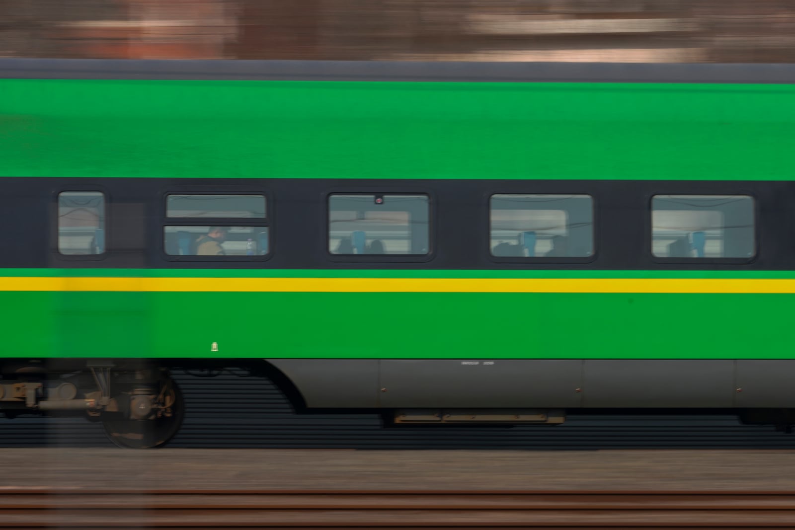 A train makes it's way as people head back home ahead of the Lunar New Year in Beijing on Friday, Jan. 24, 2025. (AP Photo/Aaron Favila)