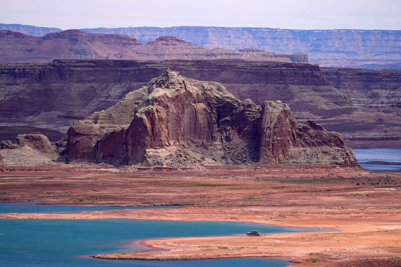 FILE - Low water levels at Wahweap Bay at Lake Powell along the Upper Colorado River Basin are pictured, June 9, 2021, at the Utah and Arizona border at Wahweap, Ariz. (AP Photo/Ross D. Franklin, File)