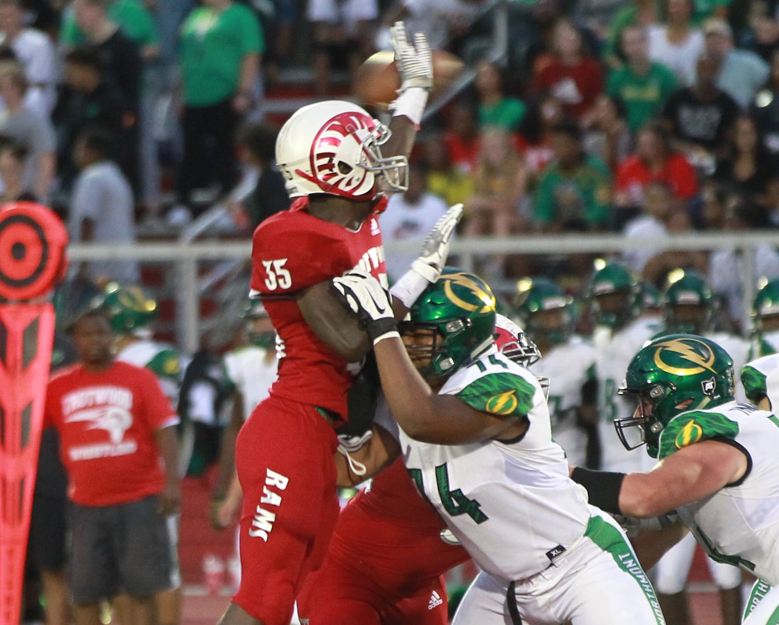 Trotwood-Madison sophomore Tyreik Gooch (35) delivers the pass-rush heat during a 20-14 Week 5 defeat of visiting Northmont on Friday, Sept. 27, 2019. MARC PENDLETON / STAFF