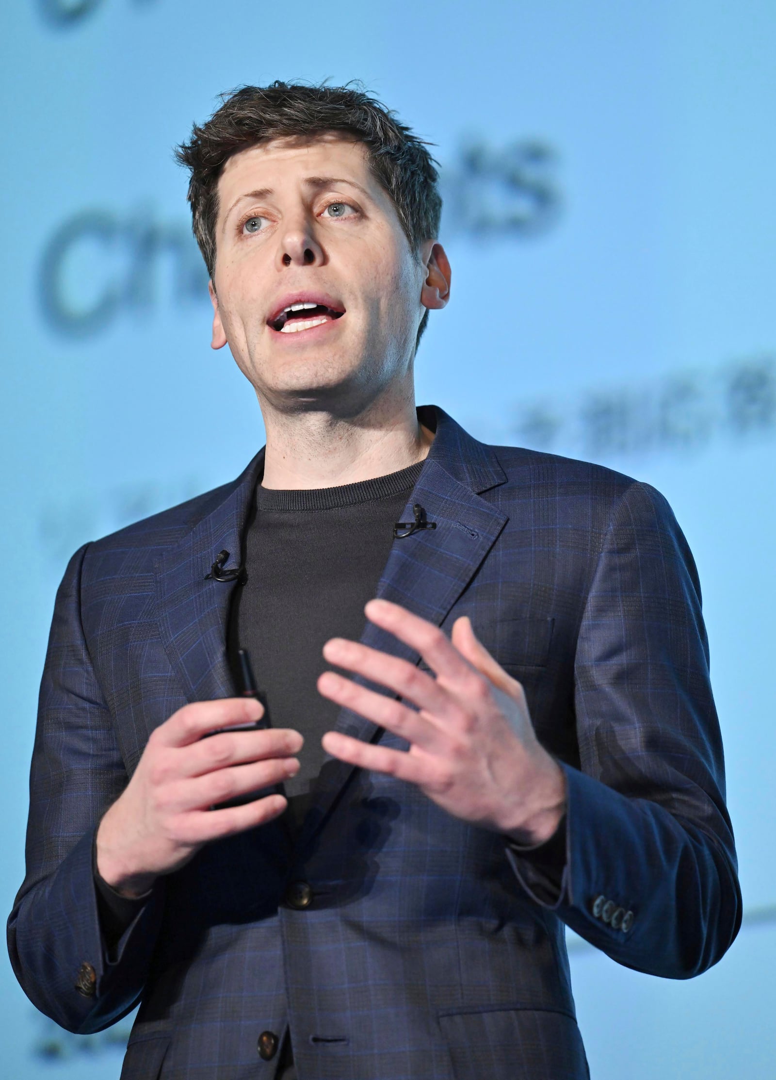 OpenAI Chief Sam Altman delivers a speech during an event for enterprises, with SoftBank Chief Masayoshi Son, in Tokyo, in Tokyo, Monday, Feb. 3, 2025. (Kyodo News via AP)