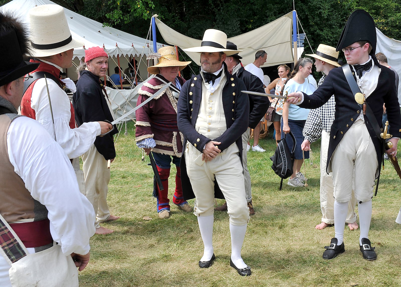 Re-enactors portray a confrontation between members of the American militia and the British Royal Navy during the Fair at New Boston in 2013. Bill Lackey/Staff