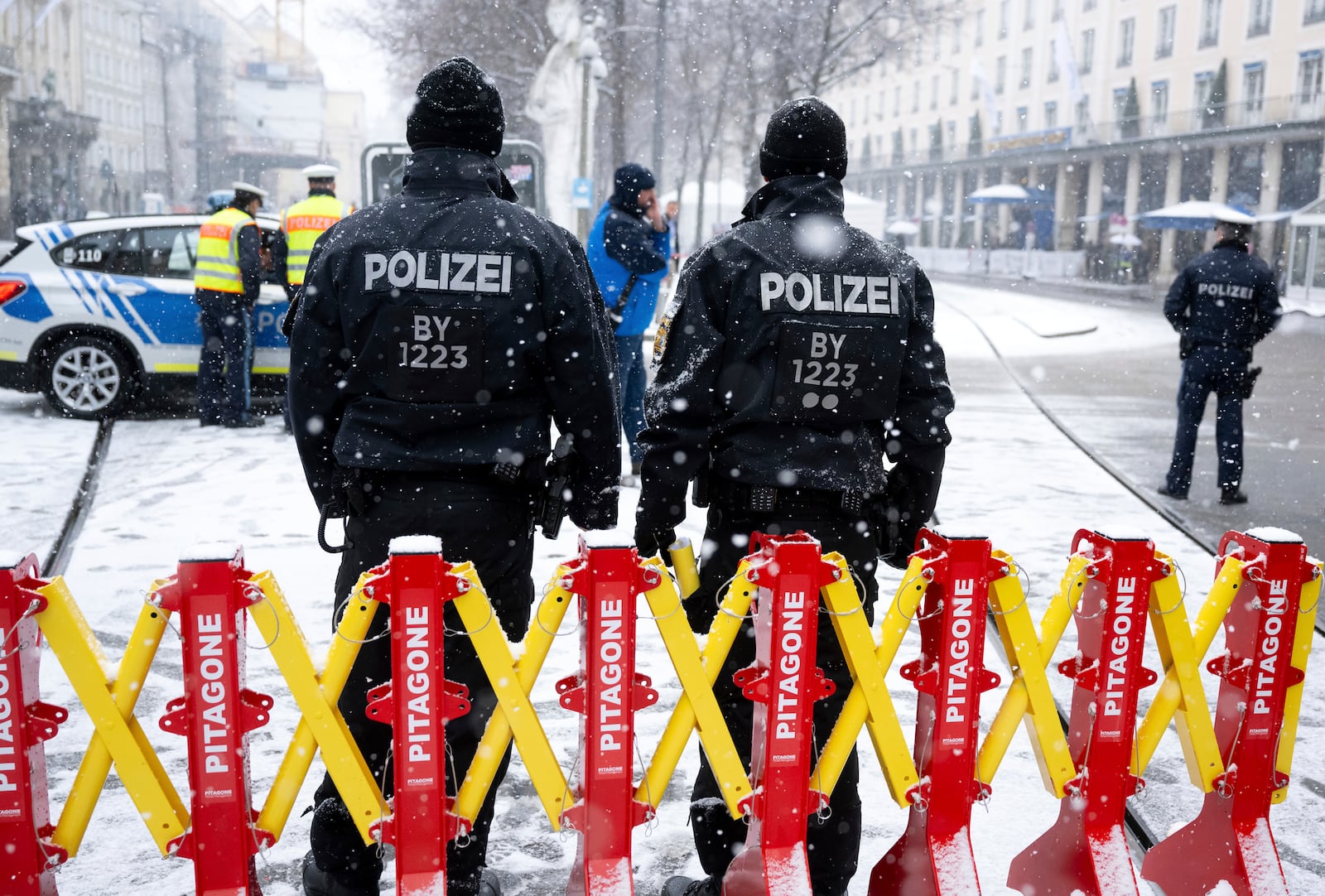 Police officers stand in front of the Hotel Bayerischer Hof before the 61st Munich Security Conference in Munich, Germany, Friday, Feb. 14, 2025. (Sven Hoppe/dpa via AP)