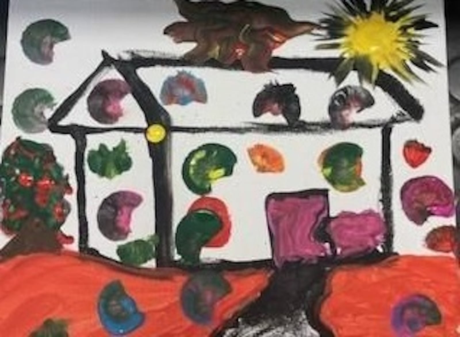 This image was created at a summer camp that took place last summer for children experiencing housing insecurity. It was a two-day workshop sponsored by the International Peace Museum. Children painted their dream houses. Over 100 children participated. PHOTO BY KATHERINE ROWELL