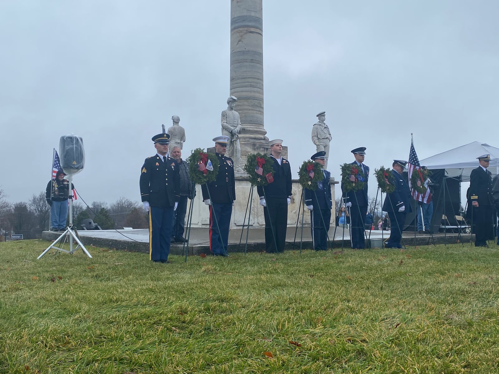 Members of the military stand to attention after presenting wreaths to represent members of each branch of the military on Saturday, Dec. 18 at Dayton National Cemetery during the Wreaths Across America ceremony. Eileen McClory / staff