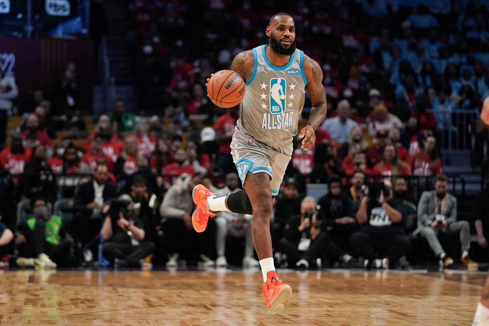 FILE - Los Angeles Lakers' LeBron James drives down the court during the second half of the NBA All-Star basketball game, Sunday, Feb. 20, 2022, in Cleveland. (AP Photo/Charles Krupa, File)